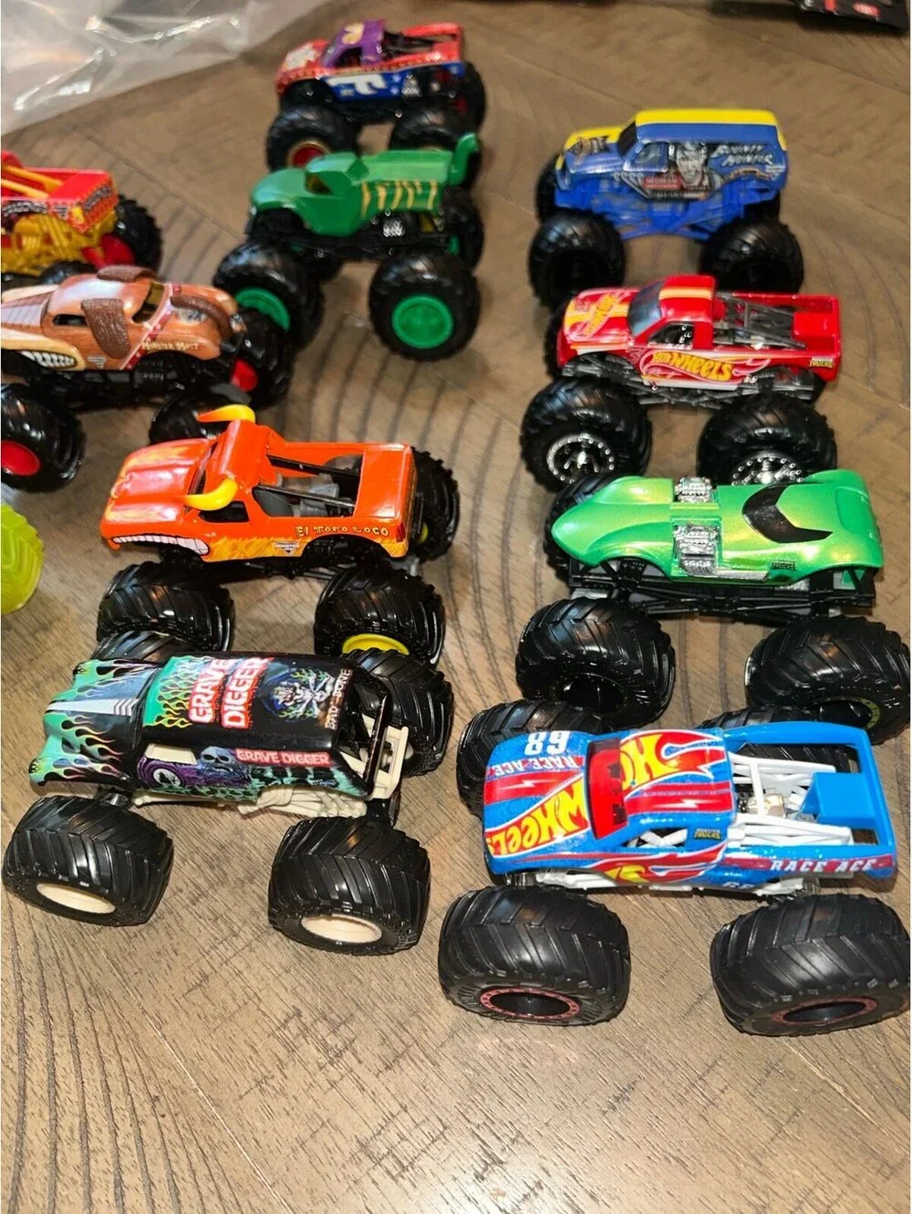 Hot Wheels Monster Trucks Lot of 11 Mixed Vehicles Shark Truck Grave Digger More